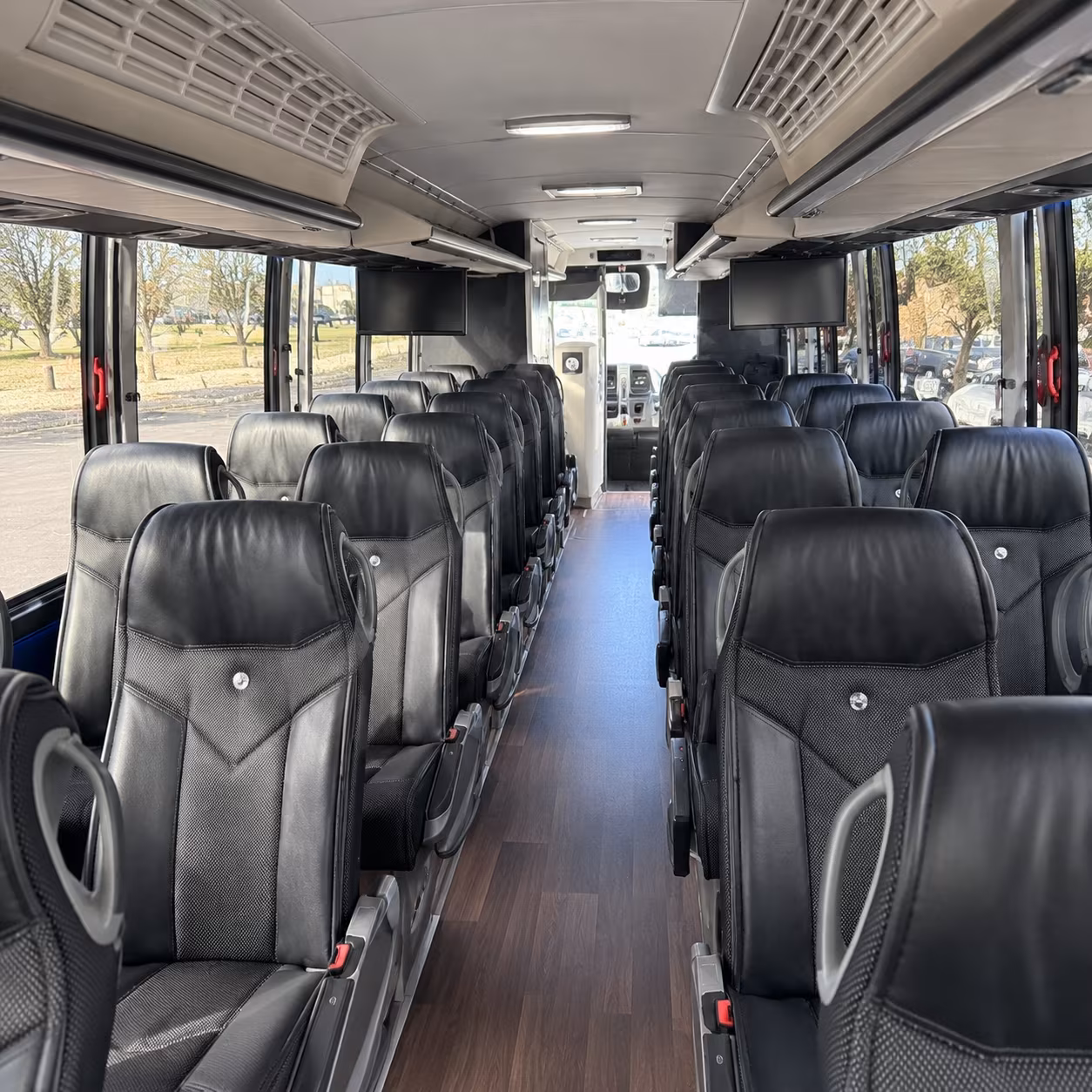 large group airport arrivals into sammamish charter bus pickup at sea